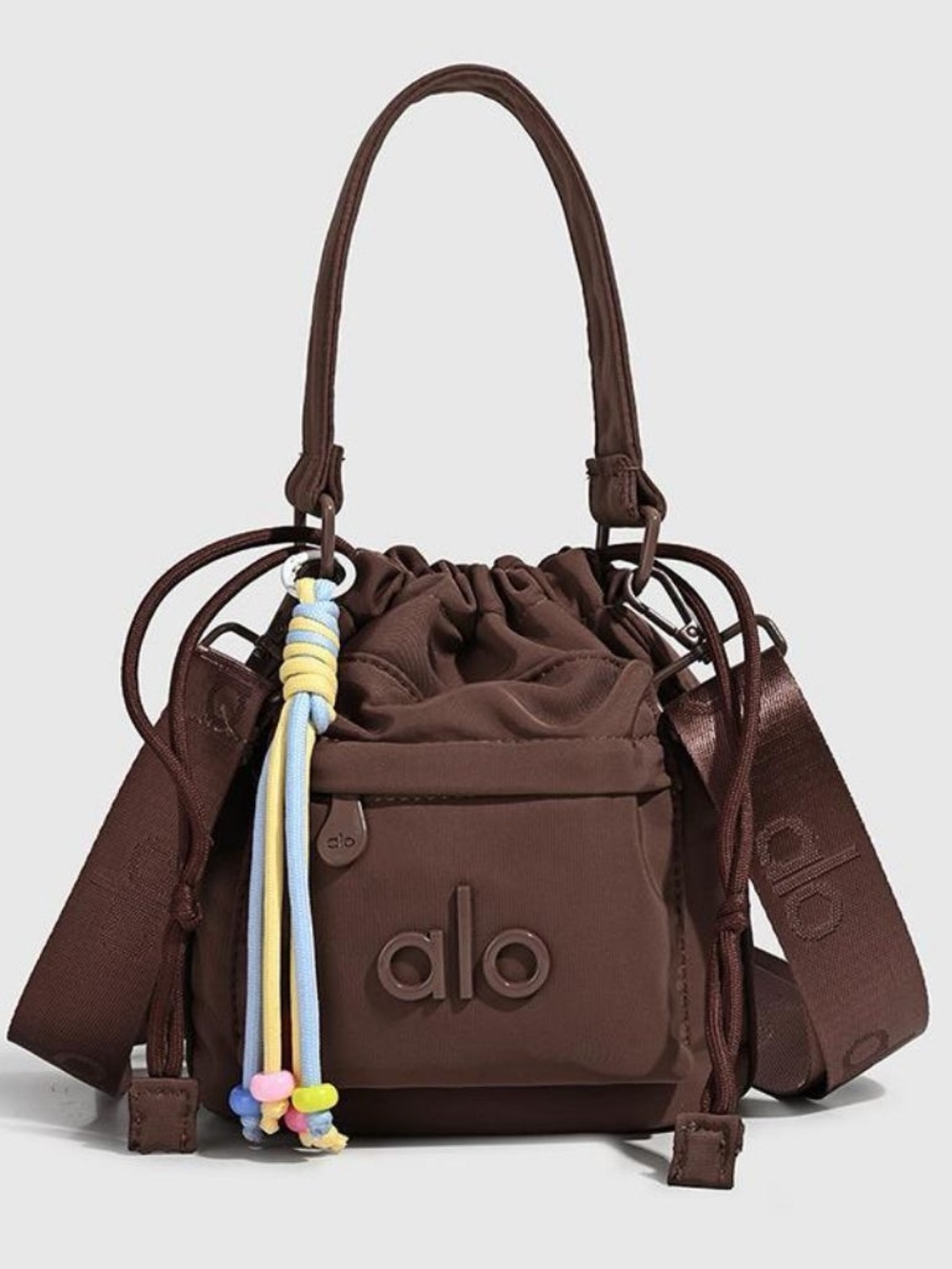 ALO Yoga Brown Drawstring Mini Crossbody Bag with Tassel Accent